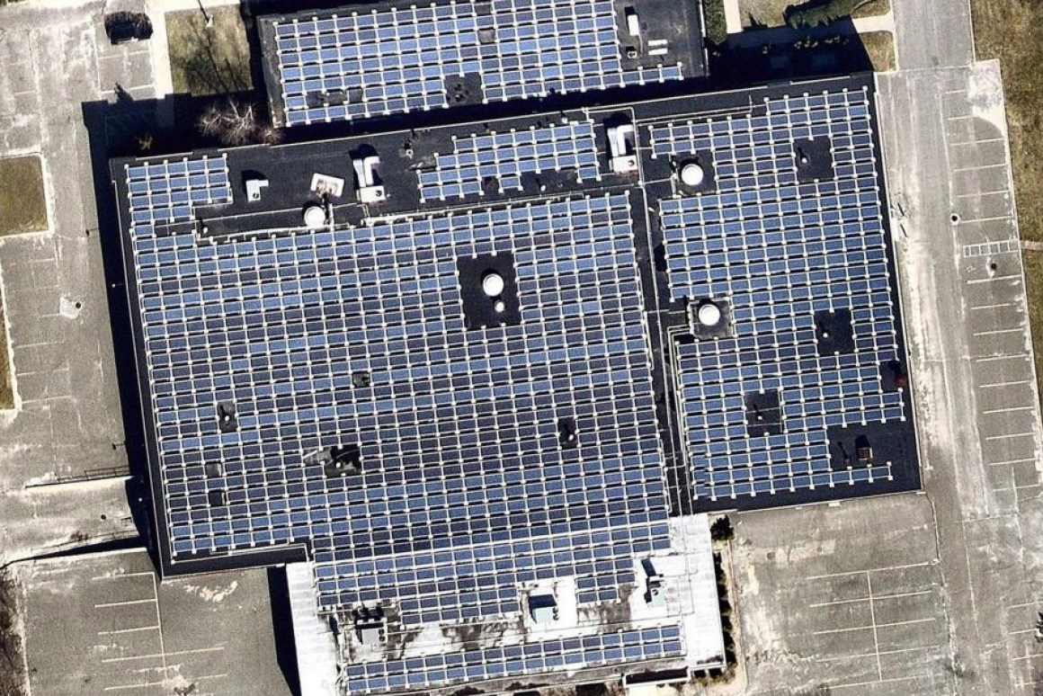 Rooftop solar panel array installed on a commercial manufacturing facility
